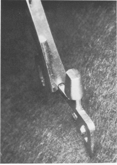 3 Grooved and straight chisel help tap endosseous blade implant in bone